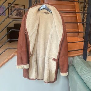 Made in Uruguay . Leather jacket with genuine lambs fur inside . Women’s size L